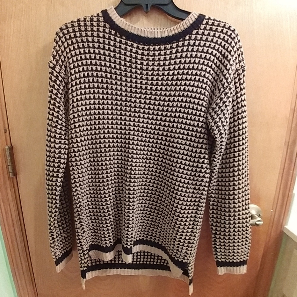 Knit sweater.